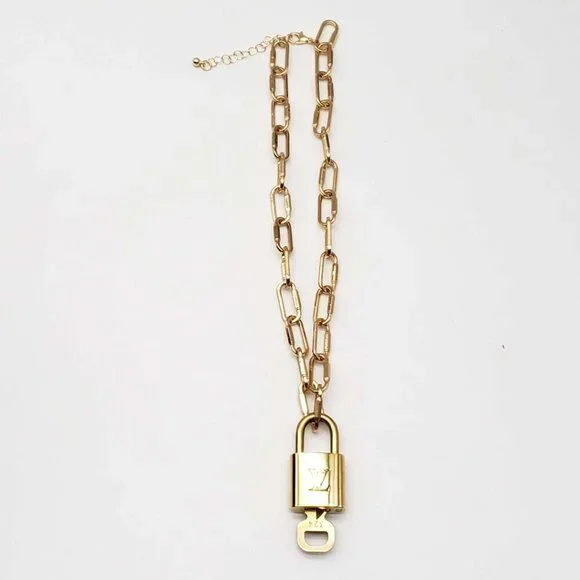 Authentic Louis Vuitton Lock and Key Gold Color with Gold Plated Chain Necklace - Picture 4 of 9